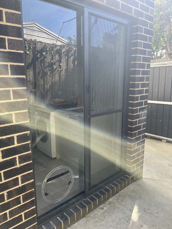 Dog Door installed in a sliding door in Safety Beach